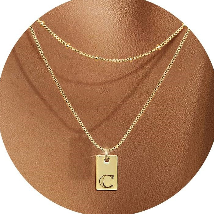 Lumière Initial Tag Layered Necklace — Gold