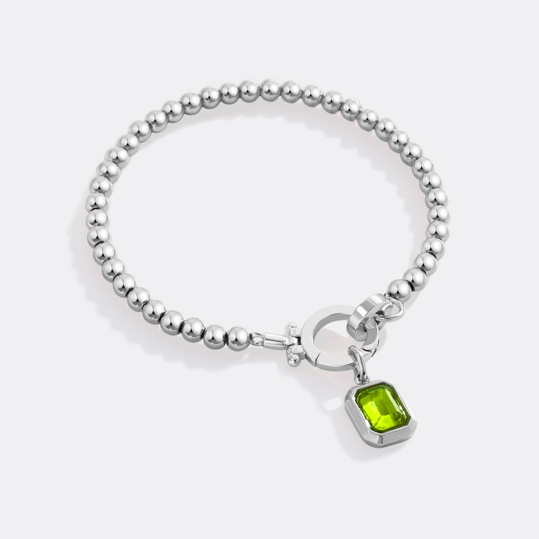 Mint Beaded Bracelet with Baguette Birthstone Charm in August Peridot, silver by Seeyoura