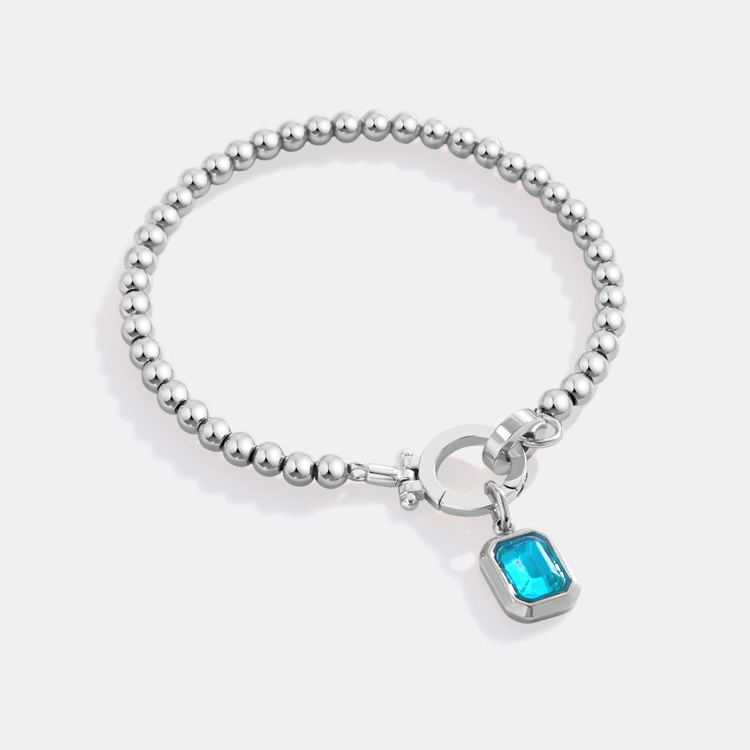 Mint Beaded Bracelet with Baguette Birthstone Charm in December Blue Topaz, silver by Seeyoura