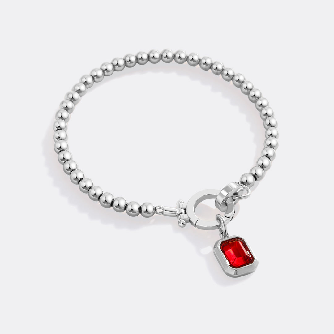Mint Beaded Bracelet with Baguette Birthstone Charm in January Garnet, silver by Seeyoura