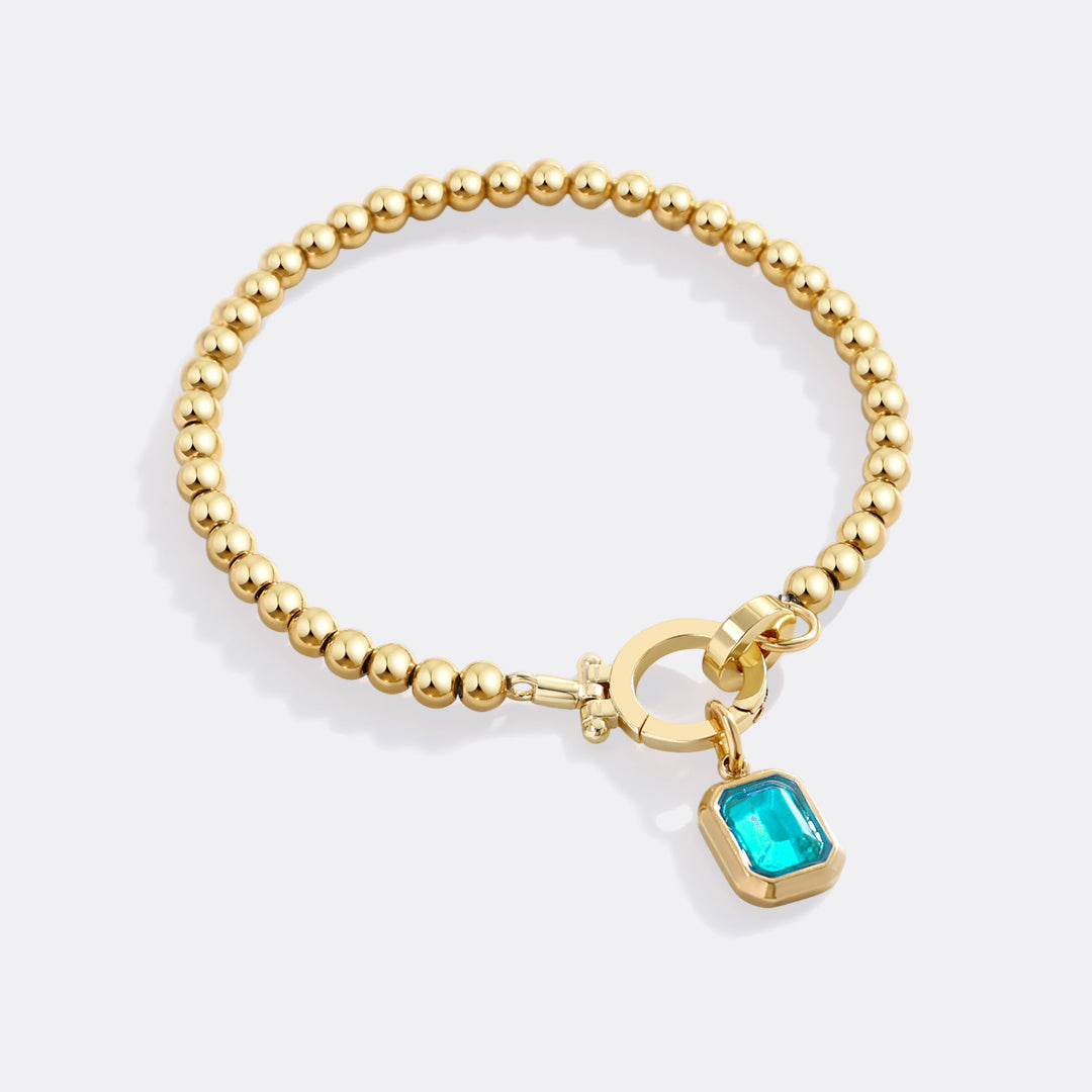 Mint Beaded Bracelet with Baguette Birthstone Charm in March Aquamarine, gold by Seeyoura