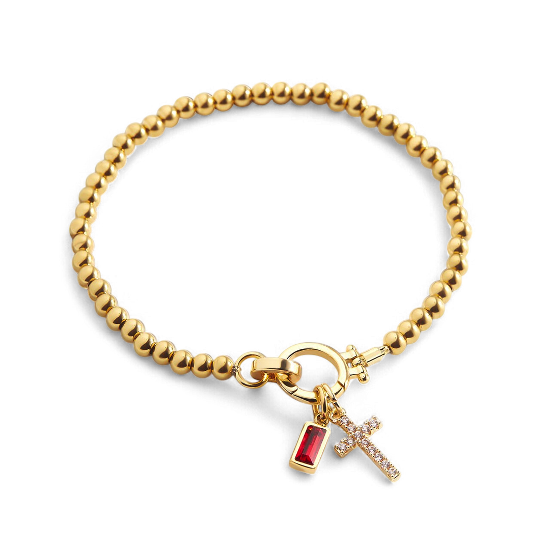 Cross Charm Birthstone Bracelet in january-garnet by Seeyoura