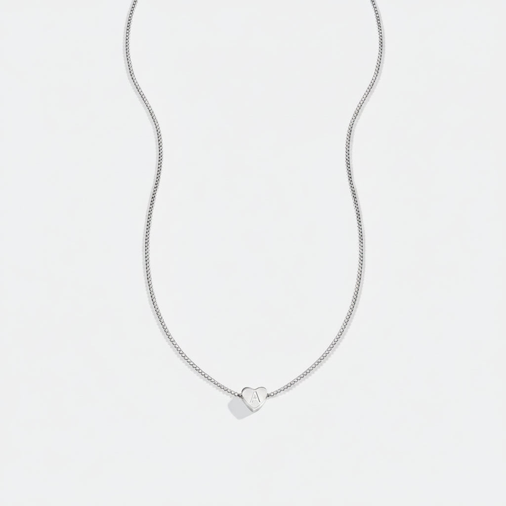 Dainty Heart Stacking Initial Necklace in silver by Seeyoura