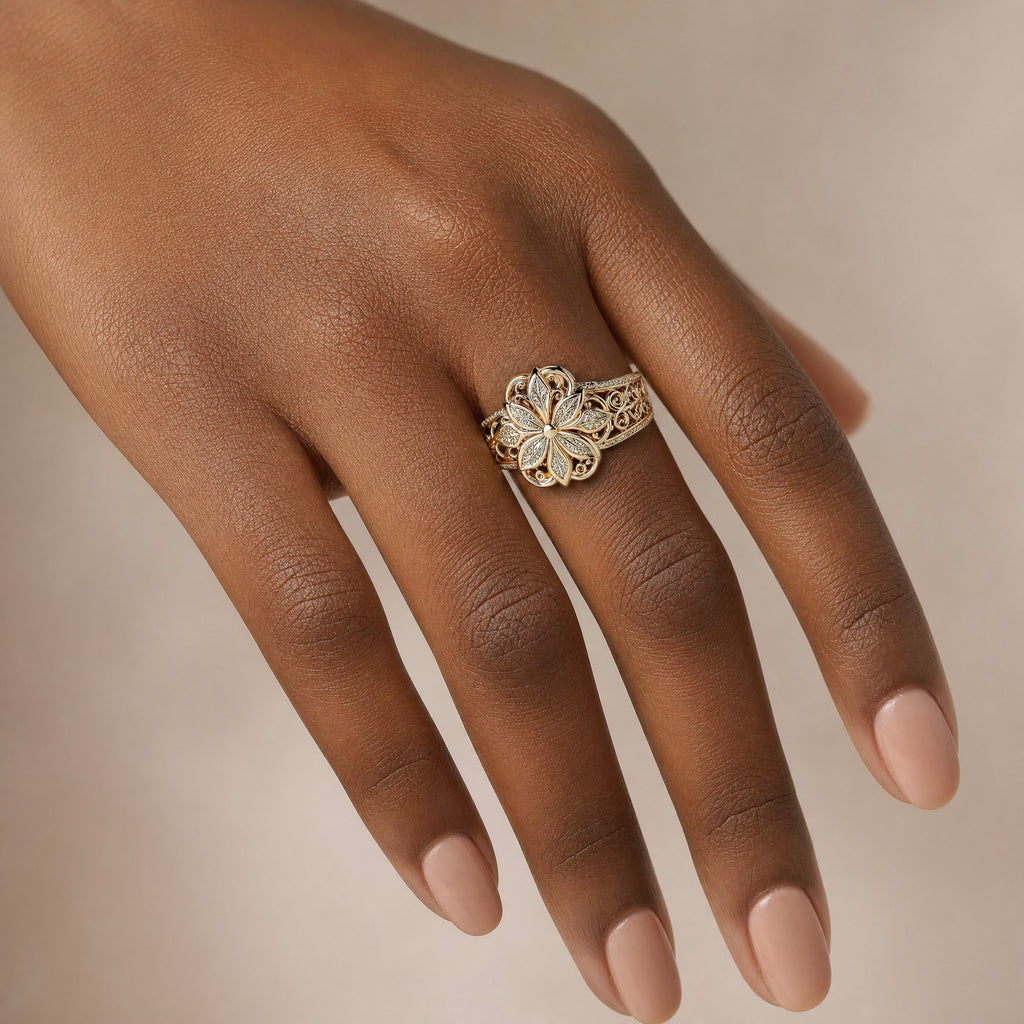Flower Zirconia Ring — Gold worn on a hand with a deep skin tone