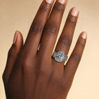 Flower Zirconia Ring — Silver worn on a hand with a deep skin tone