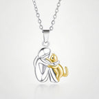 Girl Hugging Cat Necklace in girl-with-cat-gold-necklace by Seeyoura