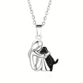 Girl Hugging Dog Necklace — Black in black-and-white by Seeyoura