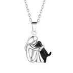 Girl Hugging Dog Necklace — Black in black-and-white by Seeyoura