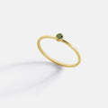 Minimalist Bezel-Set August Birthstone Stacking Band in gold by Seeyoura