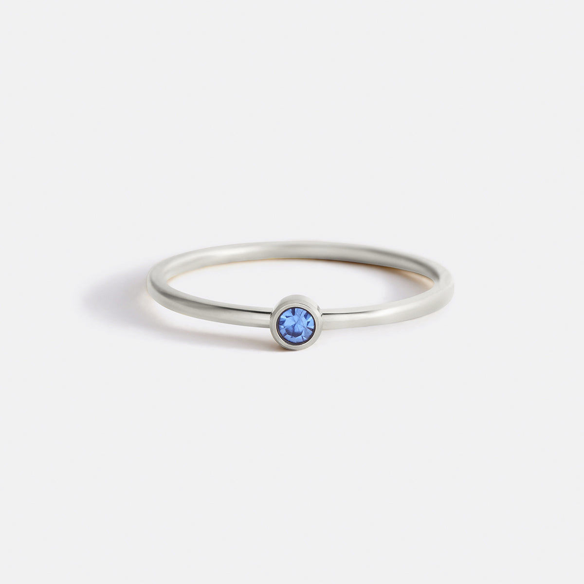 Minimalist Bezel-Set December Birthstone Stacking Band by Seeyoura