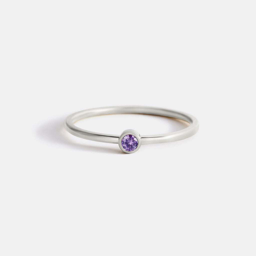 Minimalist Bezel-Set February Birthstone Stacking Band by Seeyoura