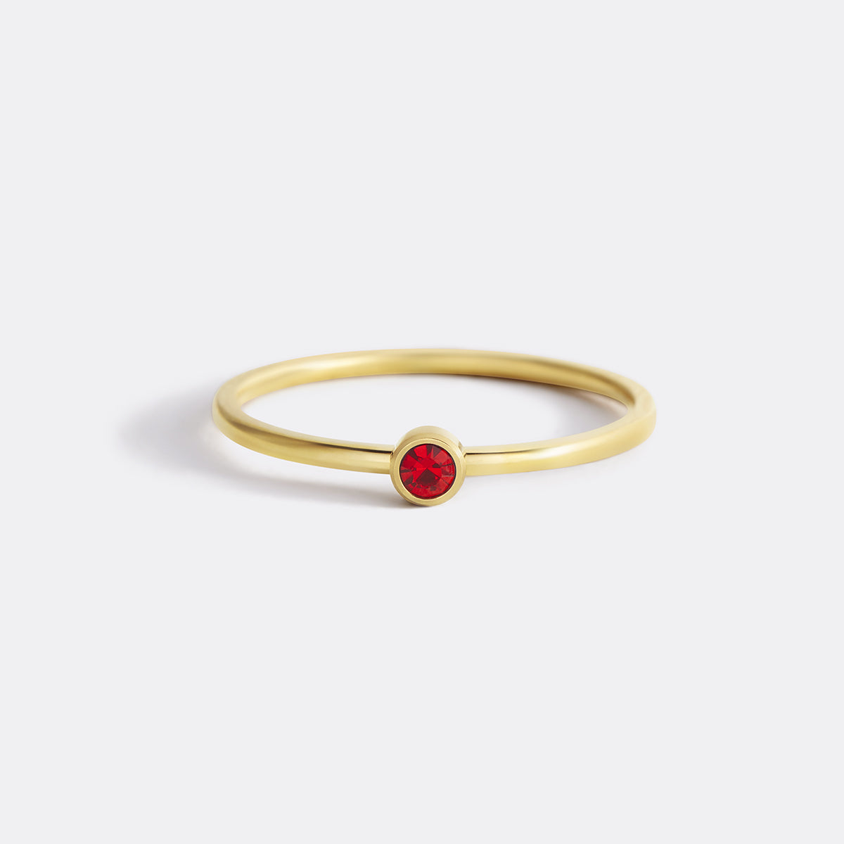 Minimalist Bezel-Set January Birthstone Stacking Band by Seeyoura