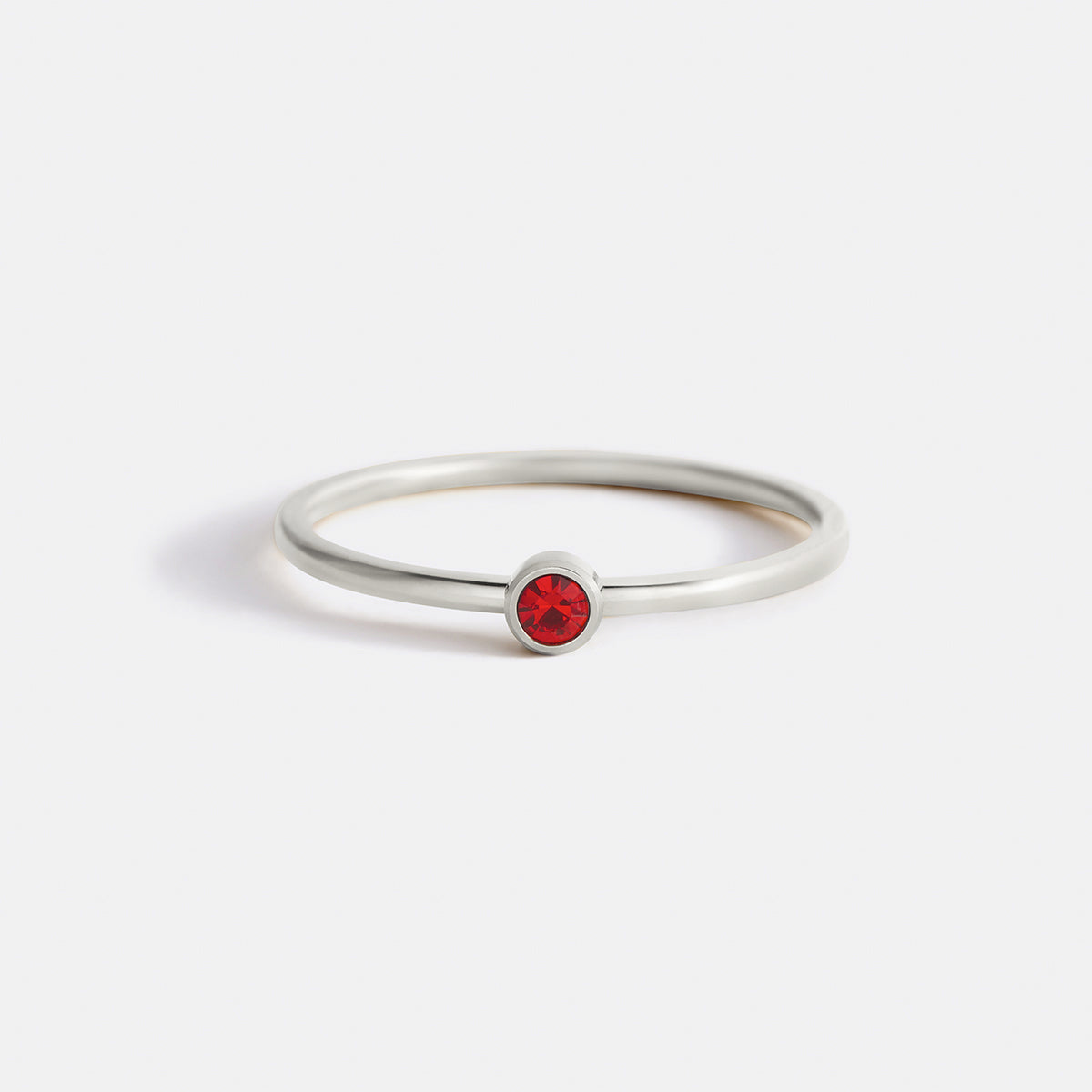 Minimalist Bezel-Set January Birthstone Stacking Band by Seeyoura