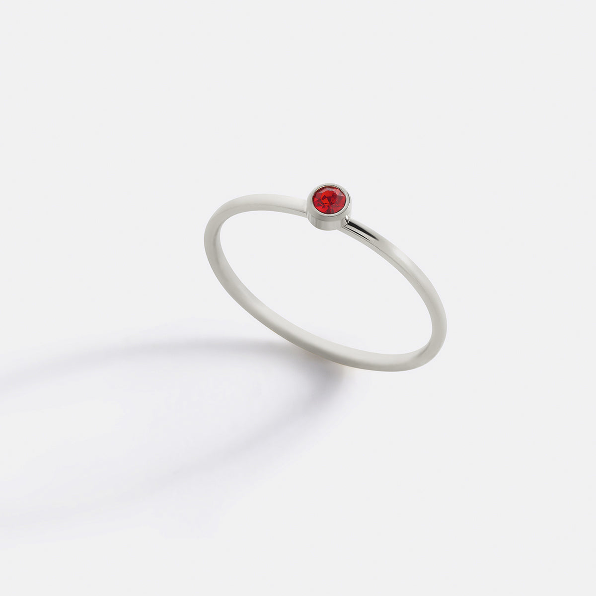 Minimalist Bezel-Set January Birthstone Stacking Band in silver by Seeyoura