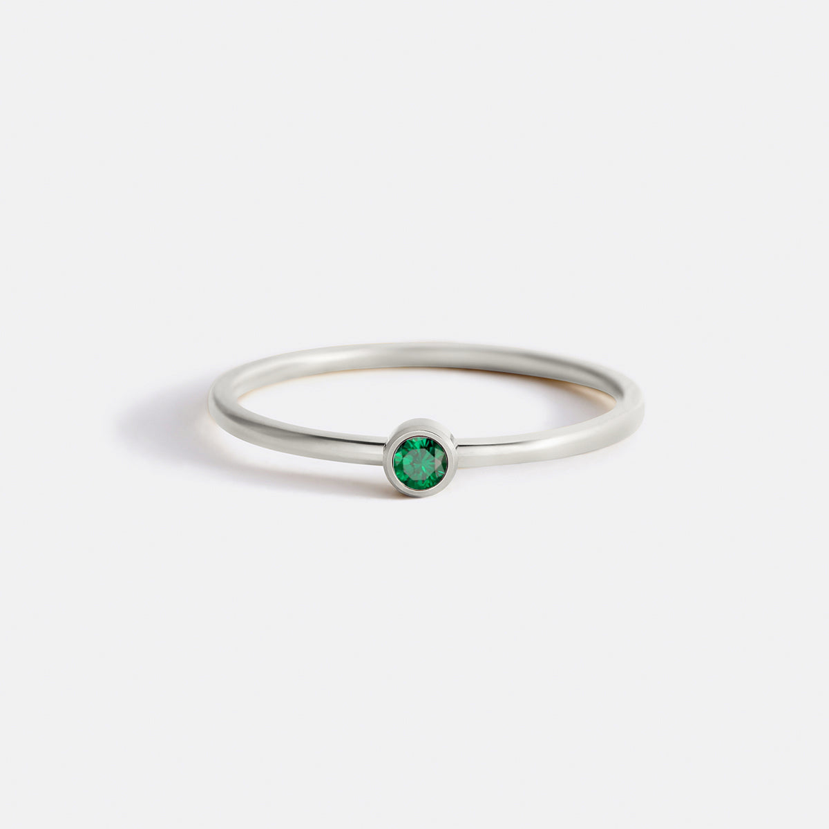 Minimalist Bezel-Set May Birthstone Stacking Band by Seeyoura