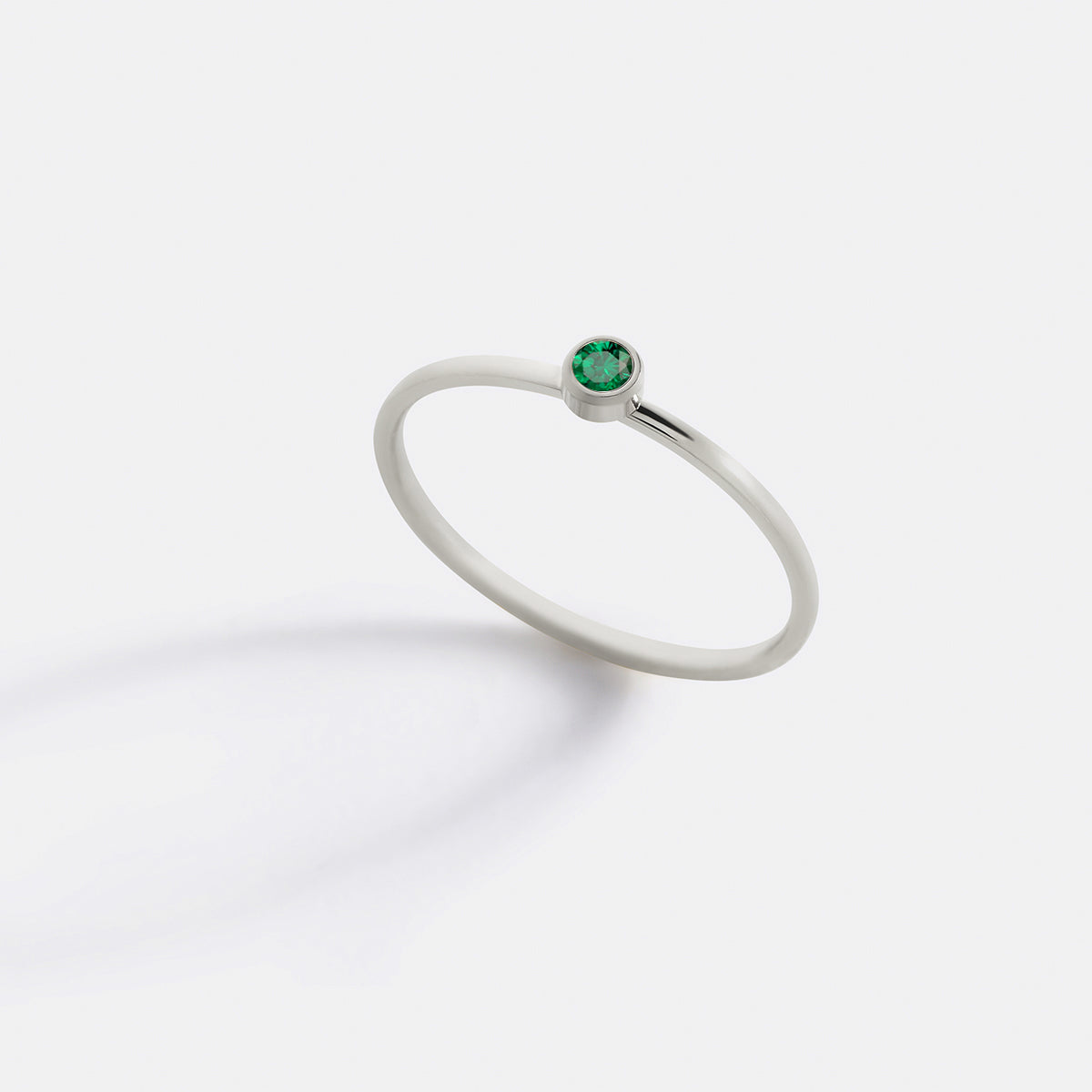 Minimalist Bezel-Set May Birthstone Stacking Band in silver by Seeyoura