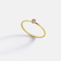 Minimalist Bezel-Set October Birthstone Stacking Band in gold by Seeyoura