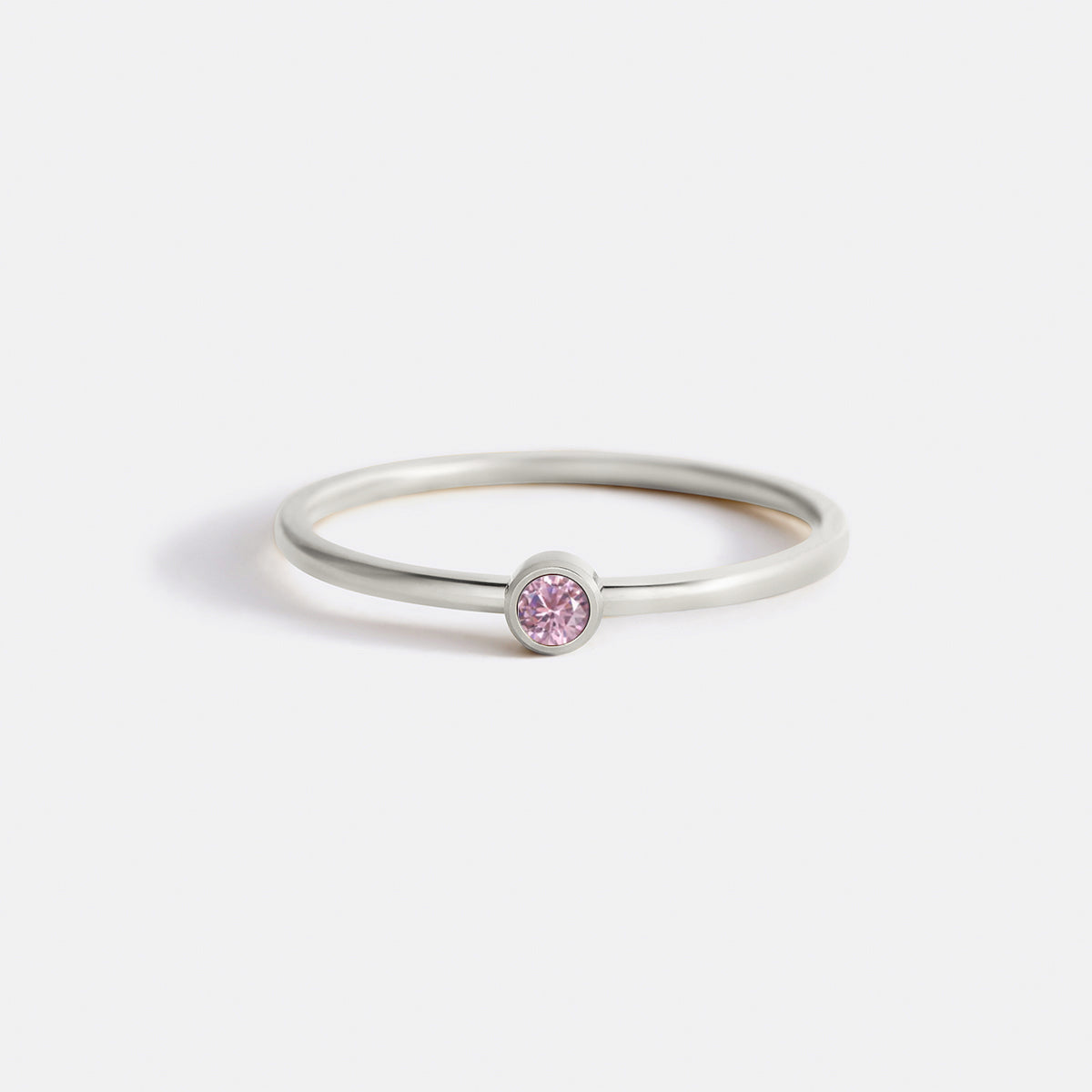 Minimalist Bezel-Set October Birthstone Stacking Band by Seeyoura