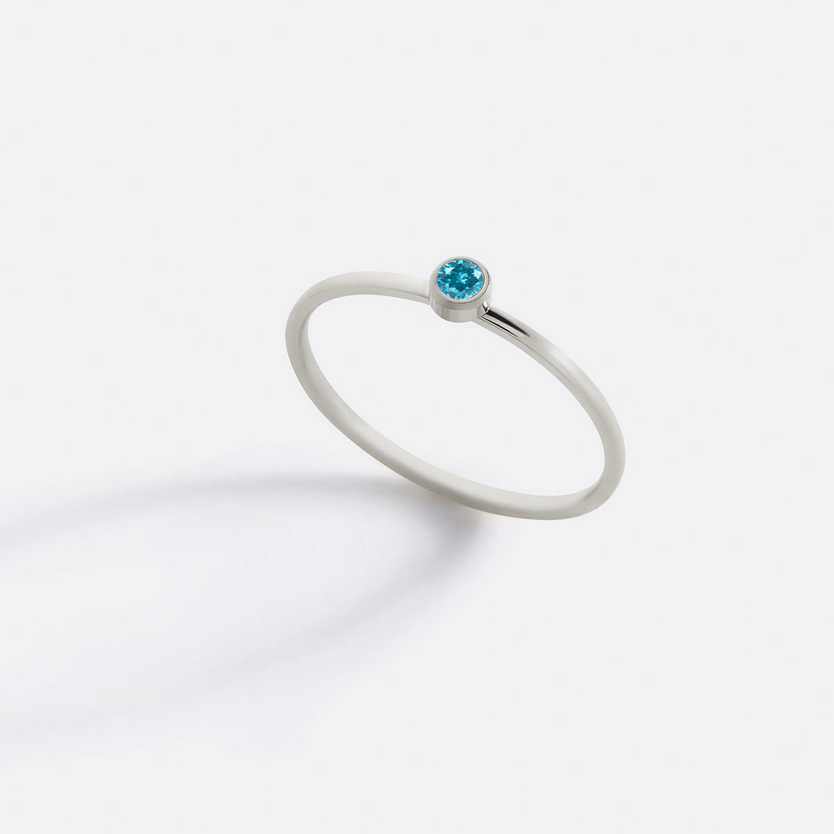 Minimalist Bezel-Set March Birthstone Stacking Band in silver by Seeyoura