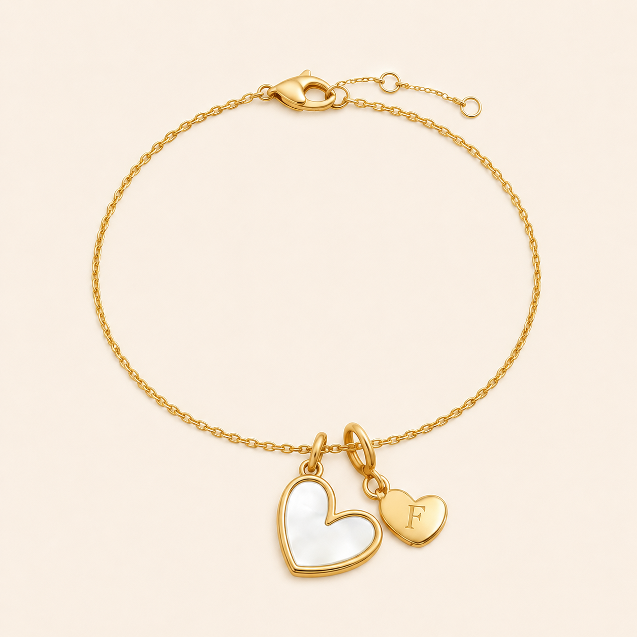 Mother of Pearl Initial Heart Charm Bracelet in F by Seeyoura