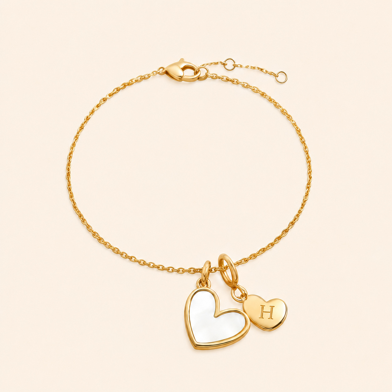 Mother of Pearl Initial Heart Charm Bracelet in H by Seeyoura