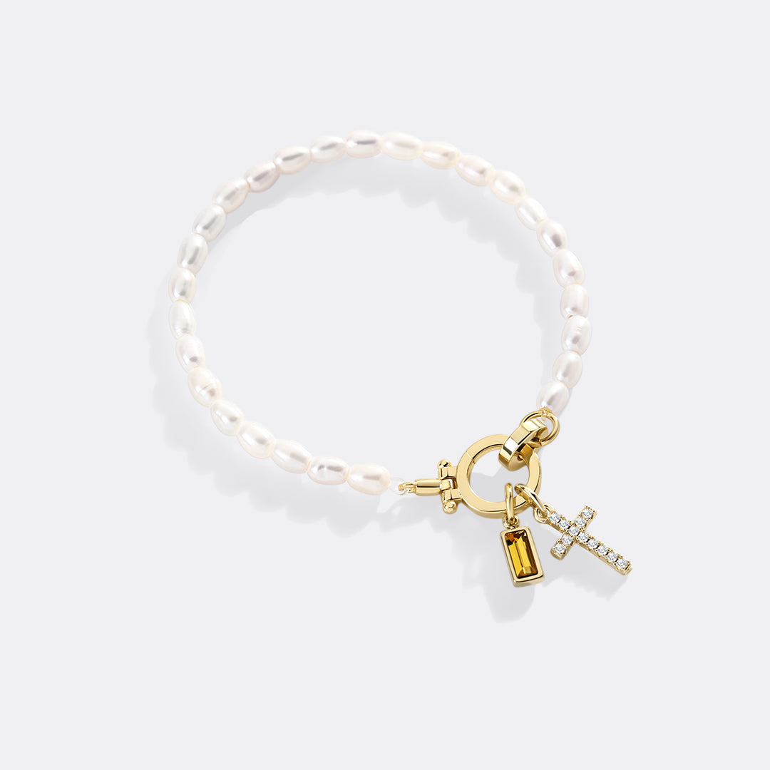 Pearl Cross Charm Bracelet by Seeyoura