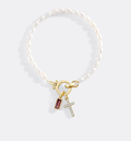 Pearl Cross Charm Bracelet in january-garnet by Seeyoura