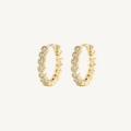 Shimmer Huggie Hoop Earrings in gold by Seeyoura