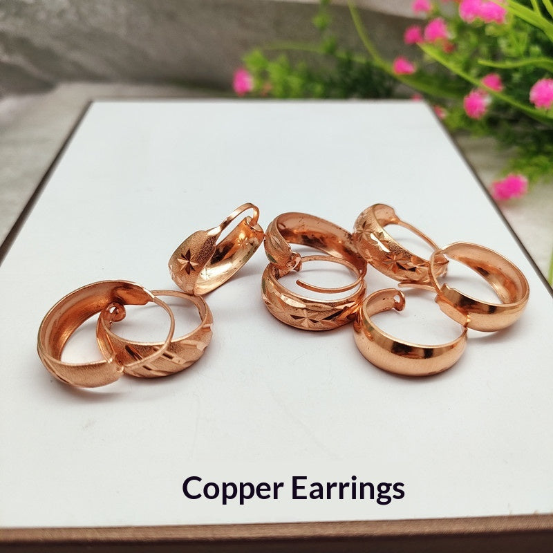 Textured Hoop Earrings by Seeyoura